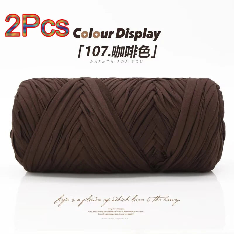 Two skeins of dark brown reusable elastic yarn for crafting displayed on a white background.