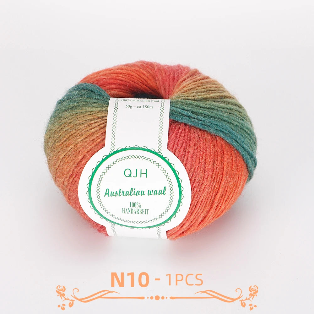 A ball of multi-colored wool yarn featuring shades of orange, green, and brown for knitting or crocheting.