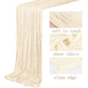 A beige boho gauze table runner with a clean edge, showing its soft texture and sheer fabric quality.