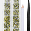 A clear plastic container holding a set of crystal hot fix rhinestones and an applicator tool for crafting