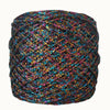 A ball of glitter metallic yarn with iridescent colors in various shades of purple, blue, and gold.