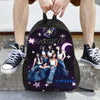 A purple canvas backpack featuring the name KATSEYE in white text and a crescent moon design.