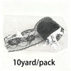 A roll of black decorative lace ribbon, 10 yards per pack.