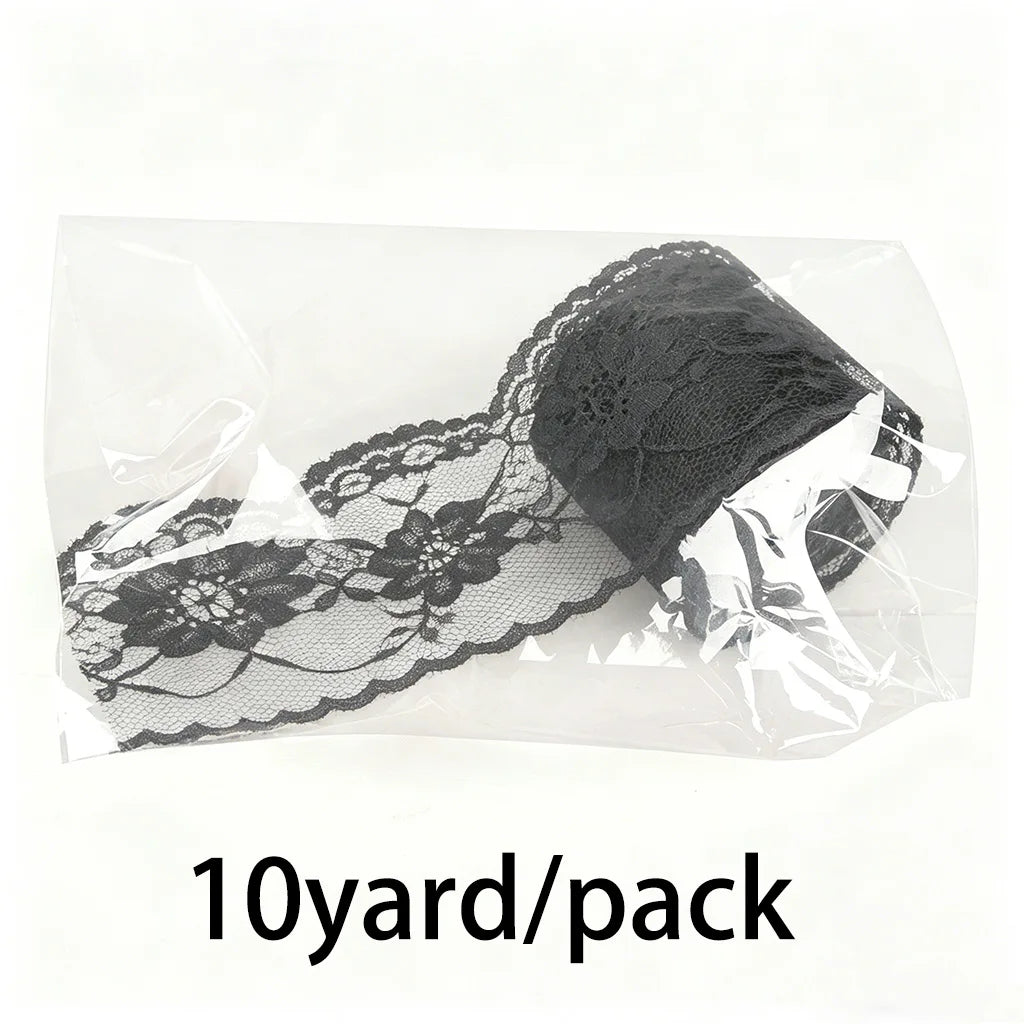 A roll of black decorative lace ribbon, 10 yards per pack.
