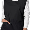 A woman wearing a black versatile polyester apron over a white shirt.