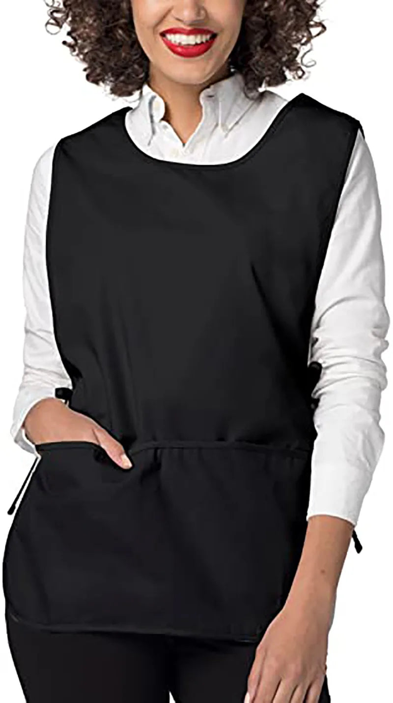 A woman wearing a black versatile polyester apron over a white shirt.