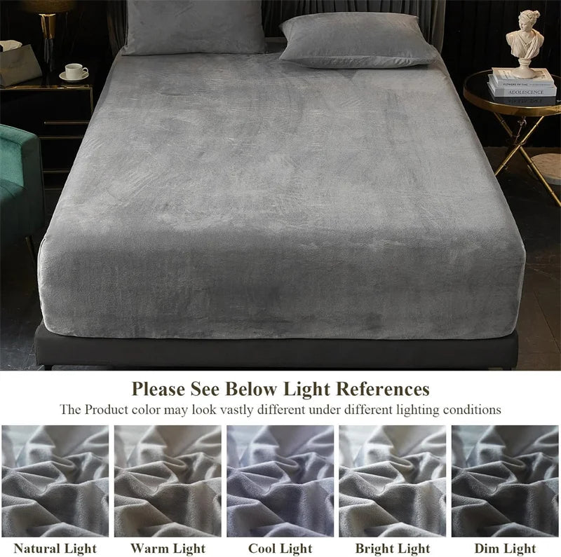 A gray luxury velvet bedding set featuring a sheet and pillow, shown on a bed.