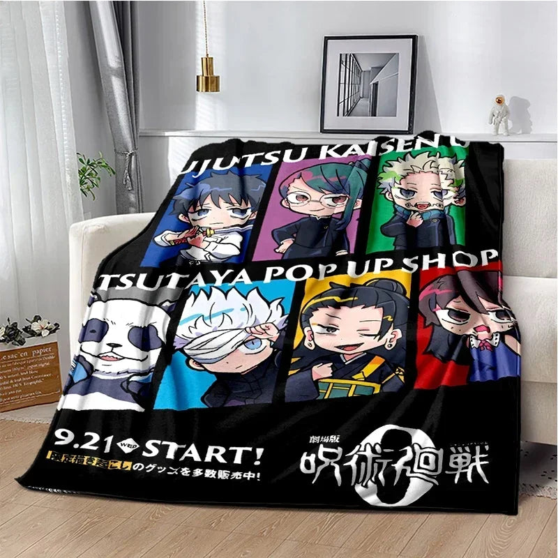 A black throw blanket featuring various Jujutsu Kaisen anime characters and text on the front.