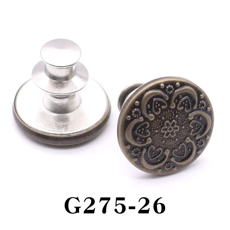 A vintage brass adjustable button pin with a round, textured design.