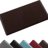 A dark brown anti-fatigue PVC kitchen mat shown from above.
