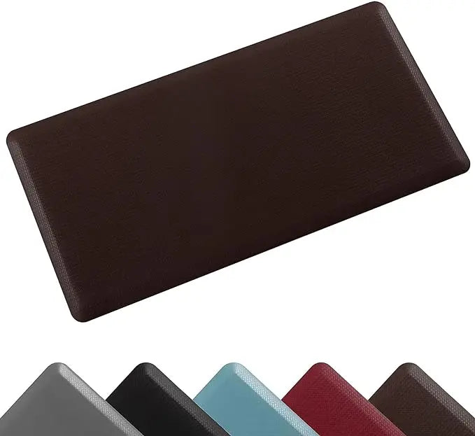 A dark brown anti-fatigue PVC kitchen mat shown from above.