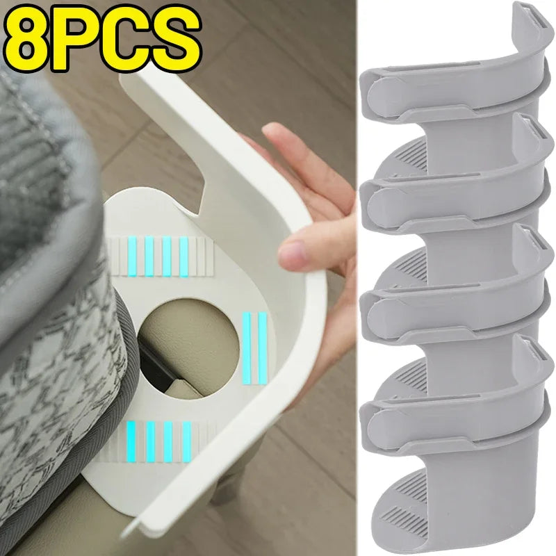Eight pieces of white invisible corner tightening clips used for securing mattresses or sofas.