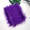 A vibrant purple faux fur plush fabric for sewing and crafting.