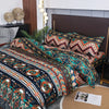 Boho geometric duvet cover set featuring patterned fabric on a bed with wooden accents.