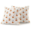 A white throw pillow cover patterned with small orange ghost and pumpkin designs.