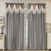 Gray sheer curtains with white wave pattern detail hanging in a window frame