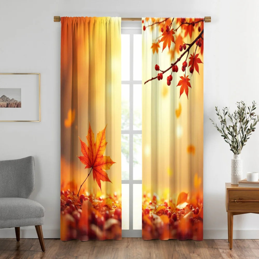 A set of two sheer curtains featuring an autumn maple leaf print with orange and red tones, hanging in a window.