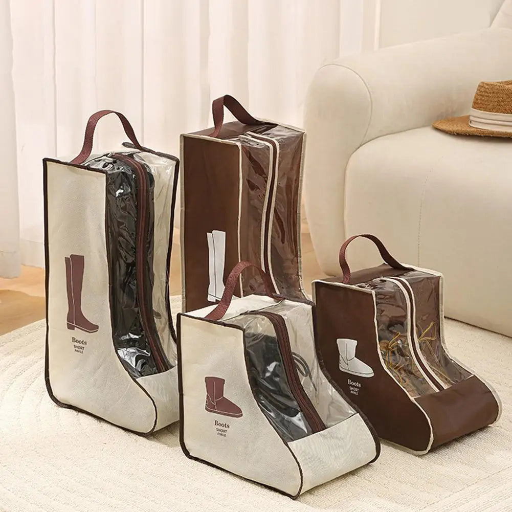 Brown boot storage bags with clear windows and carry handles displayed on a light rug.