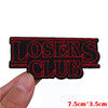 Black and red embroidered patch with the text LOSERS CLUB