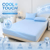 Light blue cooling fitted bed sheets displayed on a bed, emphasizing cool touch and comfort features.
