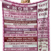 A pink and purple flannel throw blanket featuring text dedicated to a mom with loving messages.