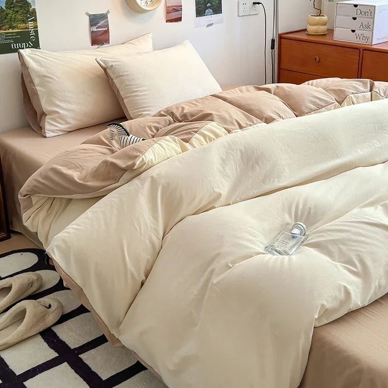 A bed dressed with ultra-soft washed cotton bedding set featuring beige and cream tones.