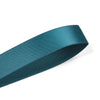 A dark teal double-sided satin craft ribbon rolled into a narrow strip.
