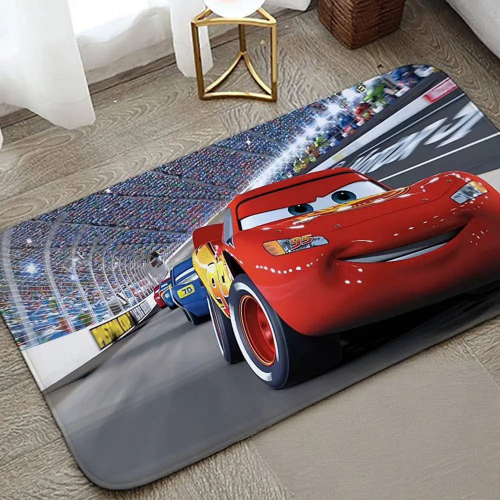 A red Minion car model is placed on a long anti-slip door mat featuring a racing track design.