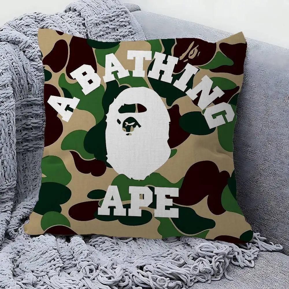 A decorative pillow cover featuring a camouflage pattern with the text ABATHING APE.