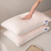 A white 3D cooling therapy pillow is shown stacked on a light-colored surface.