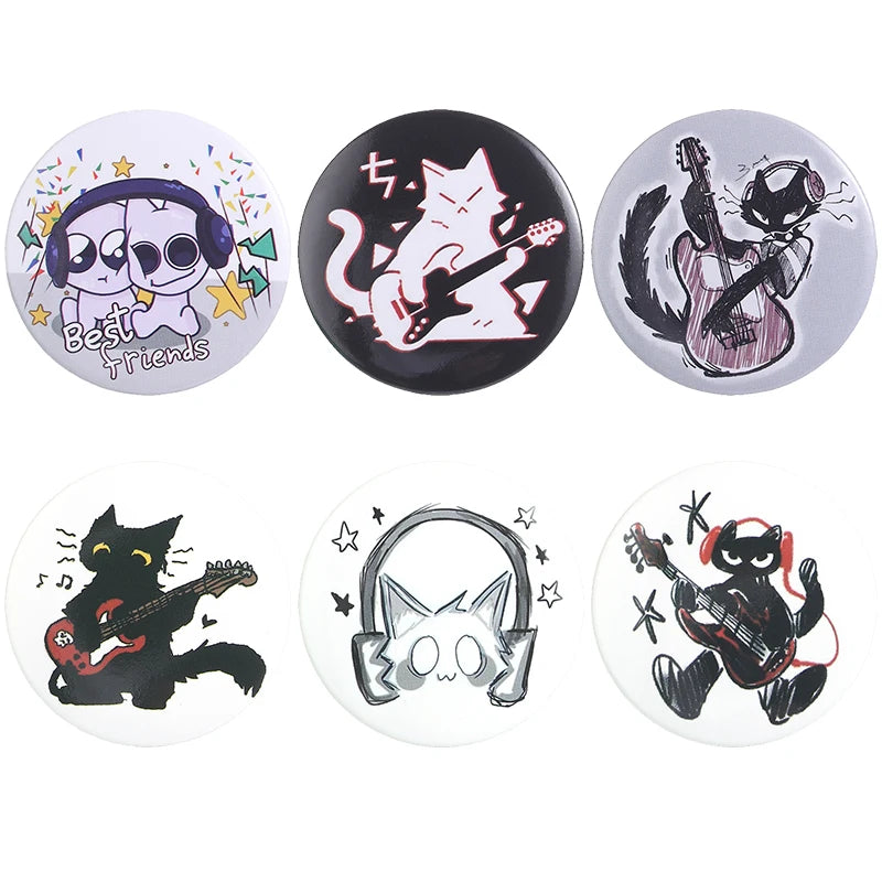 A set of three tinplate pins featuring cats and musical instruments with funny animal and music themes