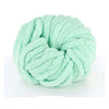 A ball of light mint green hand-woven chunky chenille yarn.