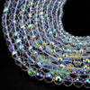 A close-up of multi-size shiny AB crystal glass beads arranged in a strand for jewelry making