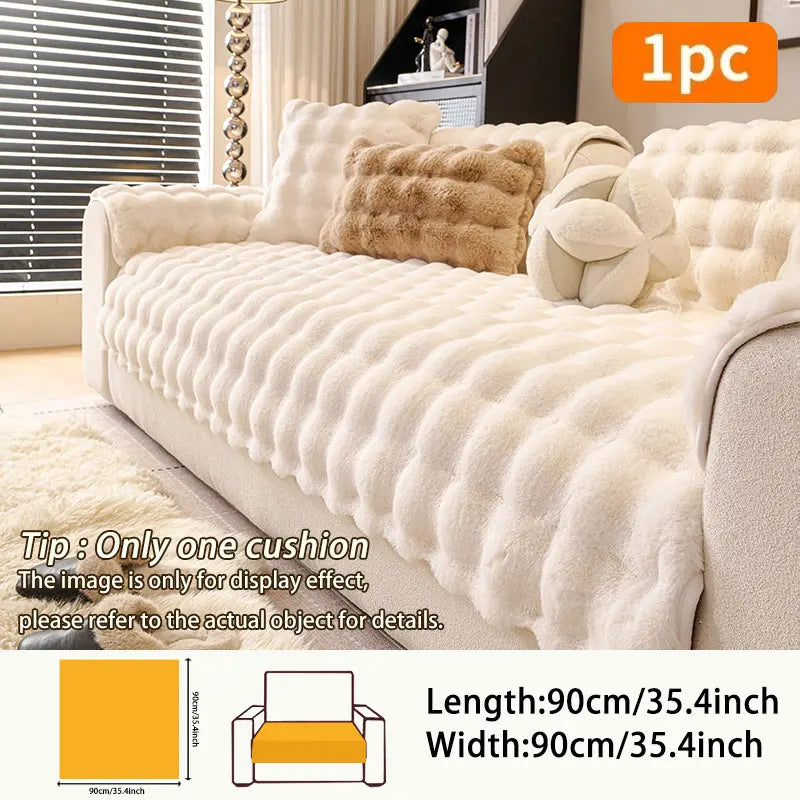 A beige plush anti-slip sofa cushion with decorative fluff and a yellow measurement guide.