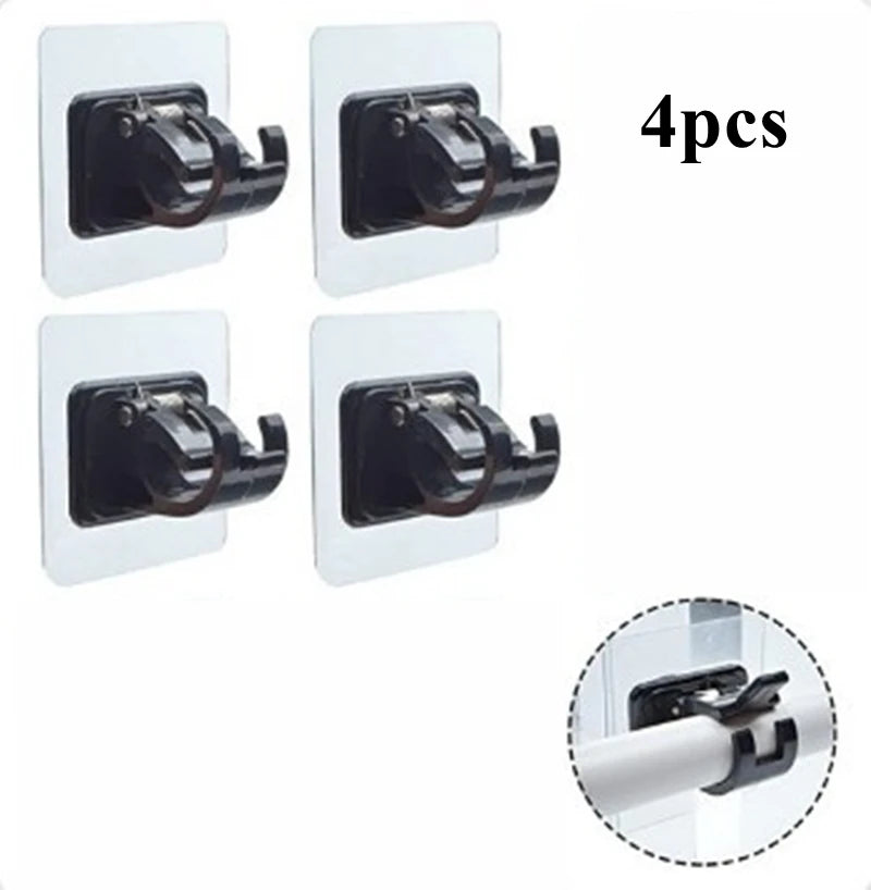 Four black nail-free adjustable curtain rod hooks for hanging curtains.