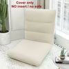 A beige folding tatami seat cover displayed on a white floor, next to a potted cactus.