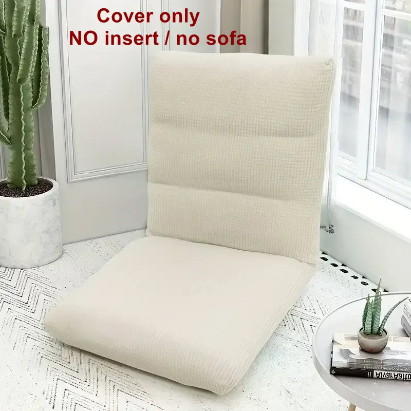 A beige folding tatami seat cover displayed on a white floor, next to a potted cactus.