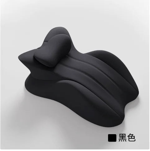 A black multi-positional memory foam wedge pillow shown from a side angle.