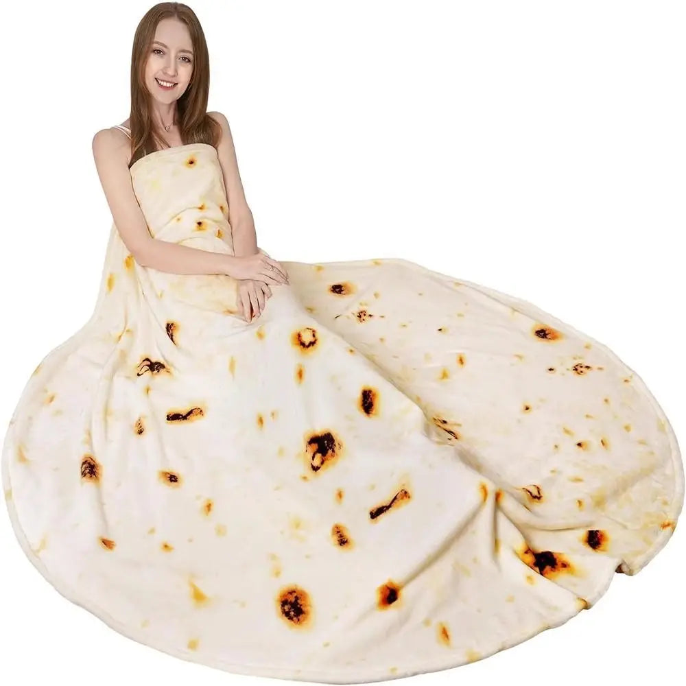 A cream-colored plush throw blanket featuring a funny pizza pattern.
