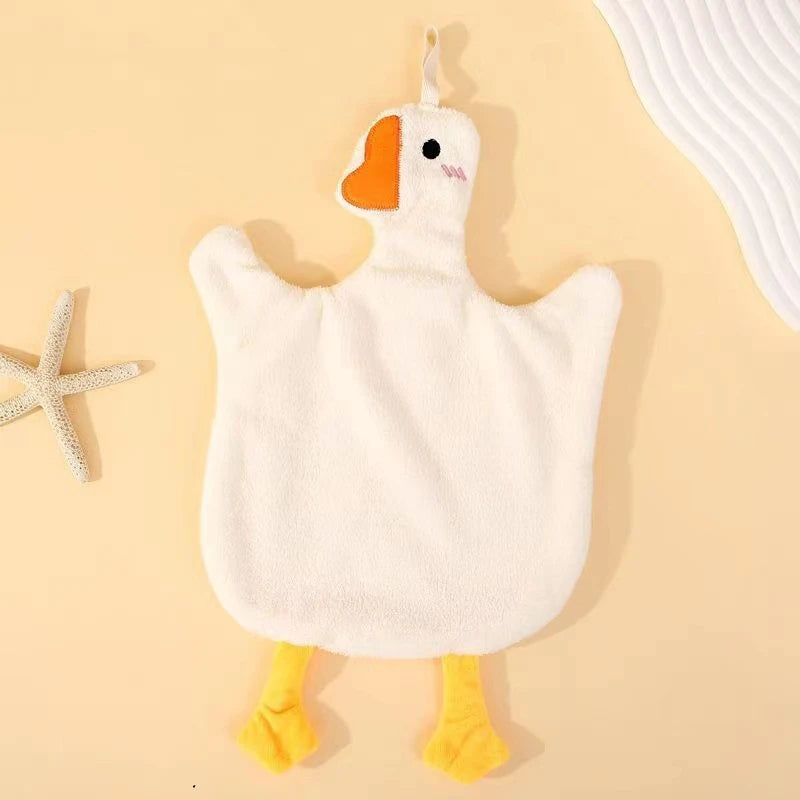 A cute cartoon goose hanging hand towel with an orange beak and yellow feet on a light background.