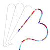A set of precision beading needles with colorful threads arranged in a heart shape for DIY jewelry making