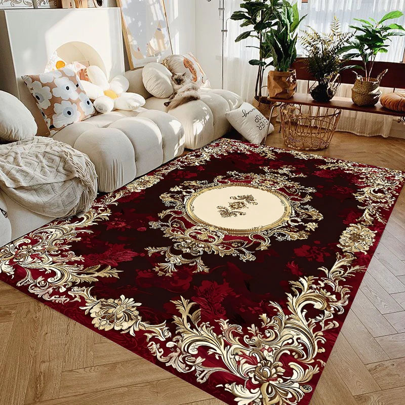A deep burgundy luxury floral area rug featuring gold accents and traditional patterns.