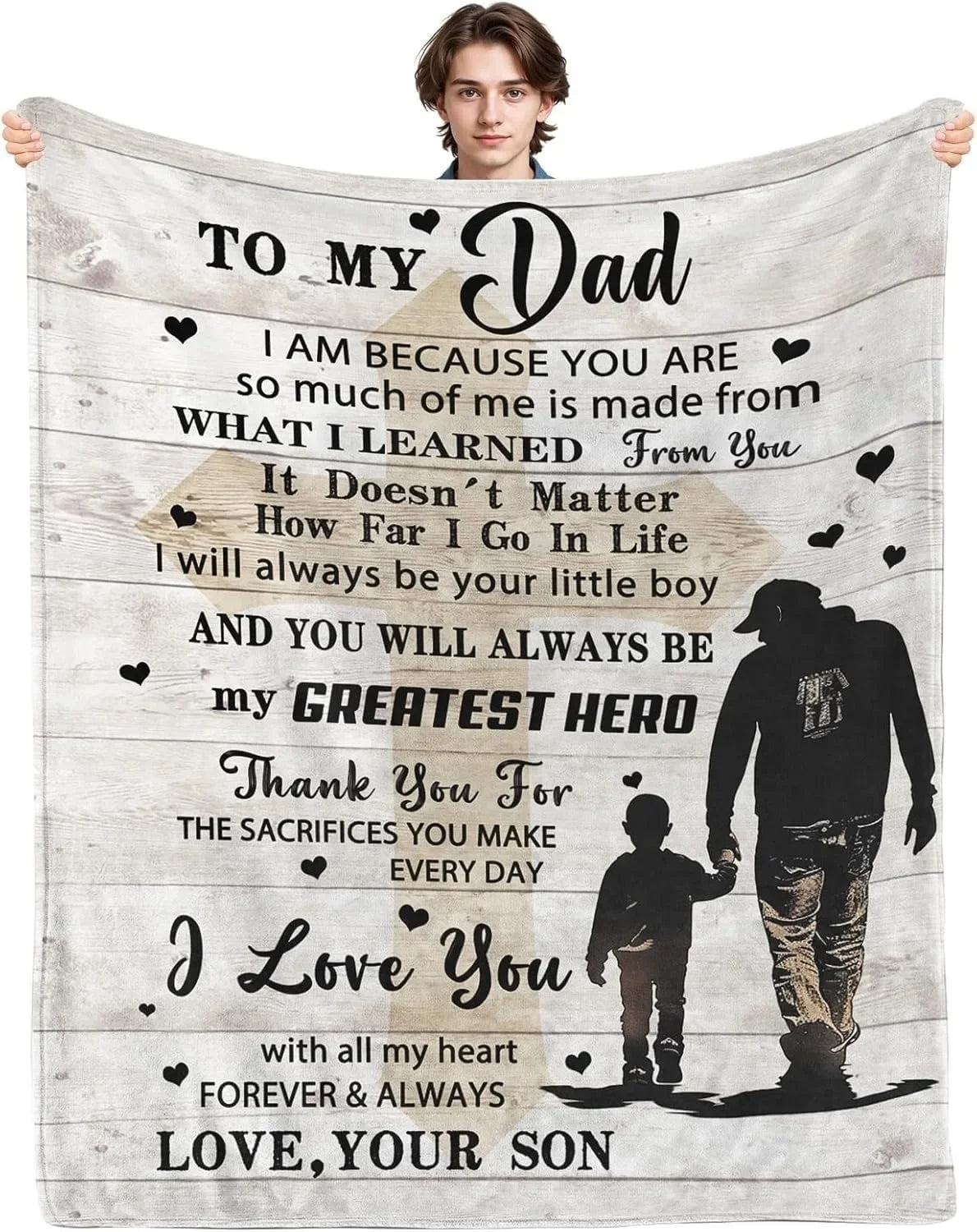 A gray knit blanket featuring a silhouette of a father and son, with text that reads To My Dad I am because you are so much o