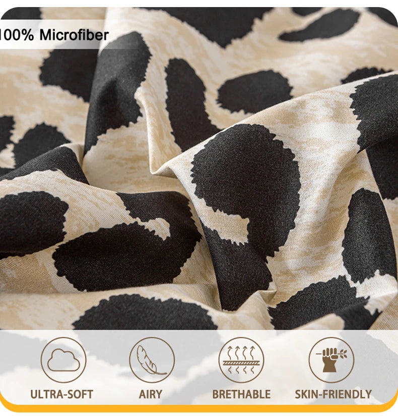 Close-up of beige and black leopard print microfiber fabric showing its ultra-soft, airy, breathable, and skin-friendly textu