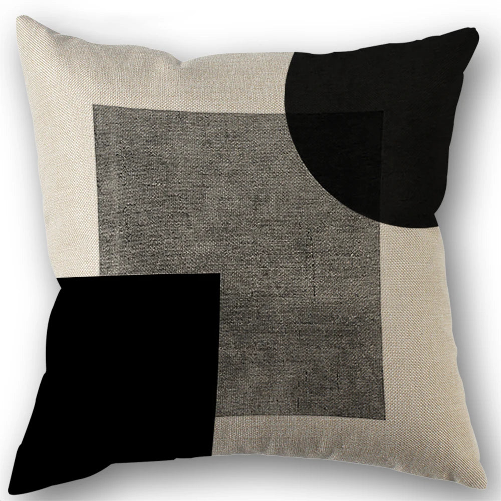 Abstract geometric throw pillow covers featuring black and beige rectangular shapes.