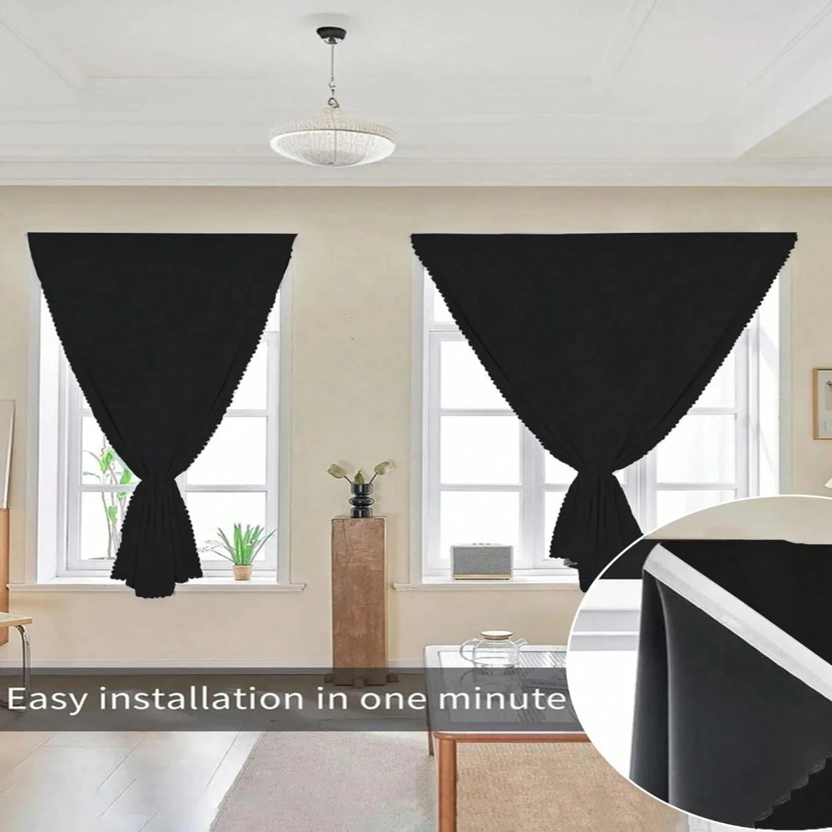 A modern black blackout curtain is installed in a window frame, shown alongside an inset detail of the fabric.