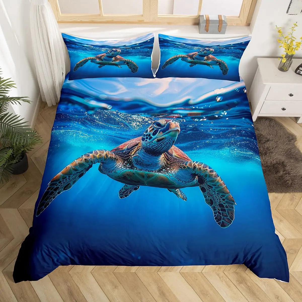 A vibrant blue sea turtle graphic duvet cover featuring a marine scene and underwater view.