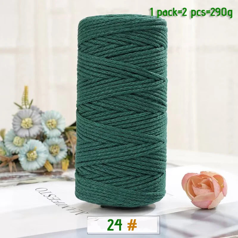 A spool of dark teal green medium-thick hand-woven cotton yarn for crafting, packaged as 1 pack of 2 pieces.