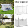 A large, sheer white outdoor mosquito net is displayed, showing its draping and mesh texture.