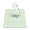 A white baby play mat with an anti-slip backing is shown on a light green surface.